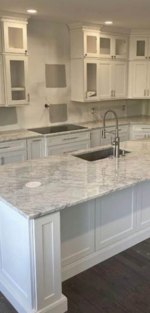 White shaker cabinetry with granite countertops and undermount sink, DFW kitchen remodel